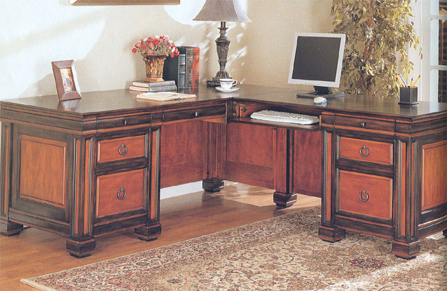 D1-800691 THIS L SHAPED DESK FEATURES A DARK TWO TONE FINISH WITH AMPLE SPACE FOR YOUR FILES AND COMPUTER. KEEP YOUR DESK ORGANIZED AND LOOKING CLEAN WITH THE FIVE STORAGE DRAWERS INCLUDING A FILE DR